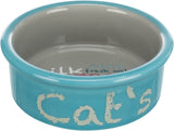 Runde, blau-graue Schale mit der Aufschrift "Cat's" außen und Schriftzug innen am Boden.