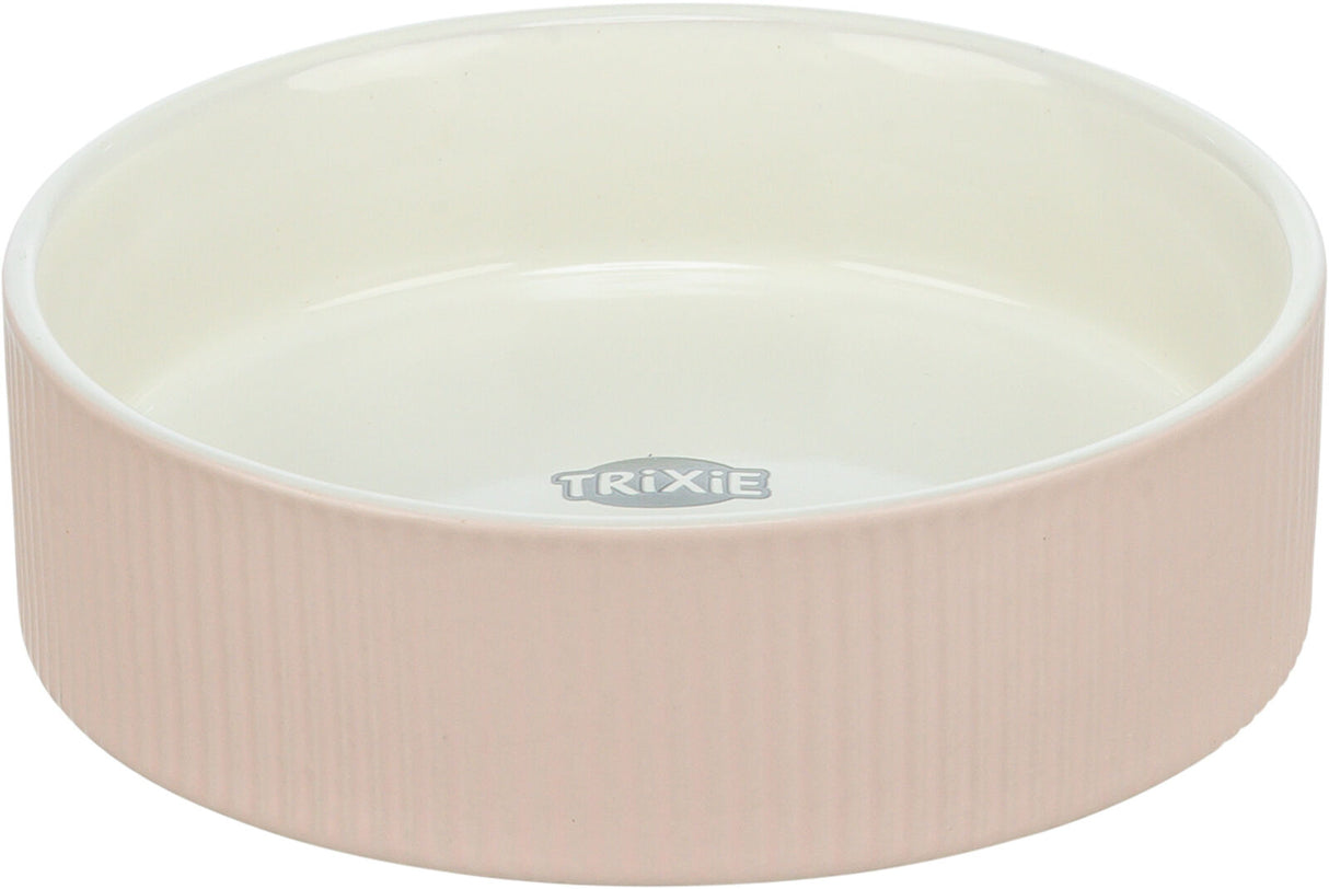 Runde, rosa Schale mit geriffelter Oberfläche und weißem Innenbereich, Marke "Trixie" sichtbar innen.