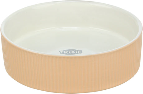 Runde, beige Schale mit geriffelter Außenseite und glatter, weißer Innenseite, "TRIXIE"-Logo sichtbar.