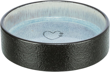 Runde Schale mit schwarzem, texturiertem Rand und blauem Innenbereich, dekoriert mit einem Herzsymbol.