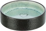 Runde, flache Schale mit schwarzer Außenseite und blauer Innenseite, dekoriert mit Herz- und Pfotenmotiv.