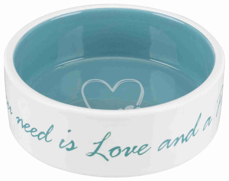 Weiße Keramikschüssel mit blauem Inneren und der Aufschrift "All you need is Love and a".