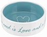 Weiße Keramikschüssel mit blauem Inneren und der Aufschrift "All you need is Love and a".