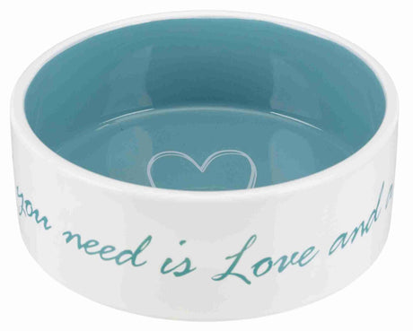 Weiße Keramikschale mit blauer Innenfläche und Herzsymbol, Außenrand mit Text „All you need is Love and a cat“.