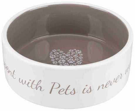 Eine weiße Futterschale mit grauem Innenraum zeigt Pfotenabdrücke in Herzform und den Text "Time spent with pets is never wasted".