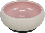 Rosa und beige Schale mit glatter Oberfläche und abgerundeten Kanten.