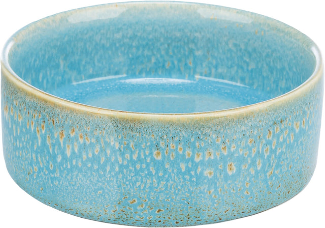 Runde, blaue Keramikschale mit hellen, gesprenkelten Mustern an den Seiten.