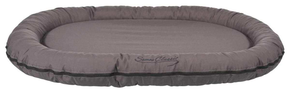 Graues, ovales Hundebett mit gepolstertem Rand, Aufschrift "Samoa Classic", glatte Oberfläche.
