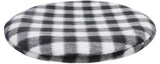 Kreisförmiges, flaches Kissen mit schwarz-weißem Karomuster.