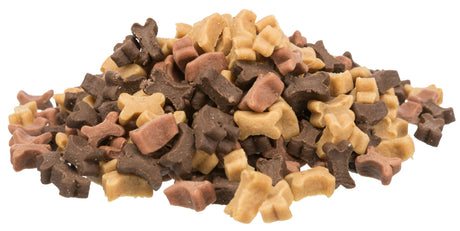Ein Haufen von kleinen, in Form von Knochen gefertigten Hundesnacks in den Farben braun, gelb und rosa.