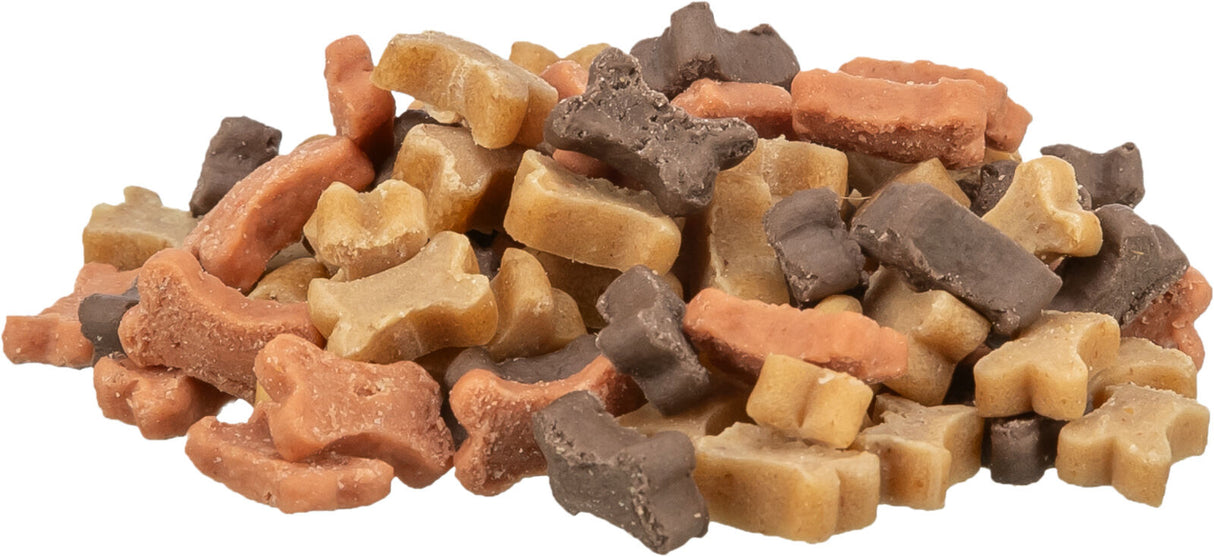 Ein Stapel von Keksen in Form von kleinen Knochen in den Farben Braun, Beige und Dunkelgrau.