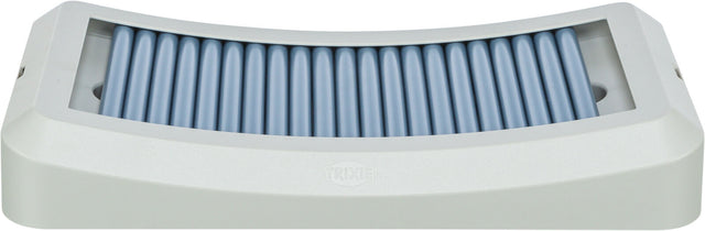 Rechteckiges, graues Gerät mit blauen, parallelen Rillen in der Mitte, sichtbares "Trixie"-Logo.