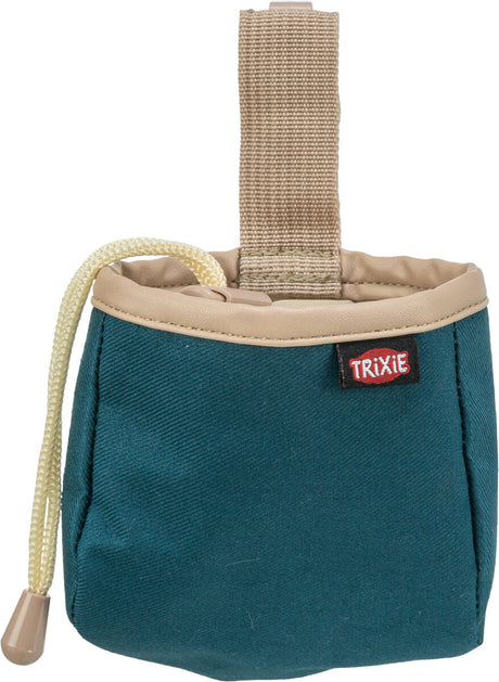 Kleine Tasche aus blauem Stoff mit beigem Rand und Tragegriff, Markenlogo "Trixie" sichtbar.