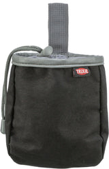 Eine schwarze Tasche mit grauem Rand und Aufhänger, Zugkordel und rotem Trixie-Label auf der Vorderseite.