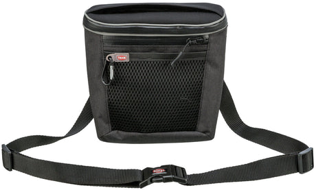 Schwarze Tasche mit Tragegurt und Netzfront, Reißverschluss und Label "Trixie" sichtbar, geeignet für Transport.