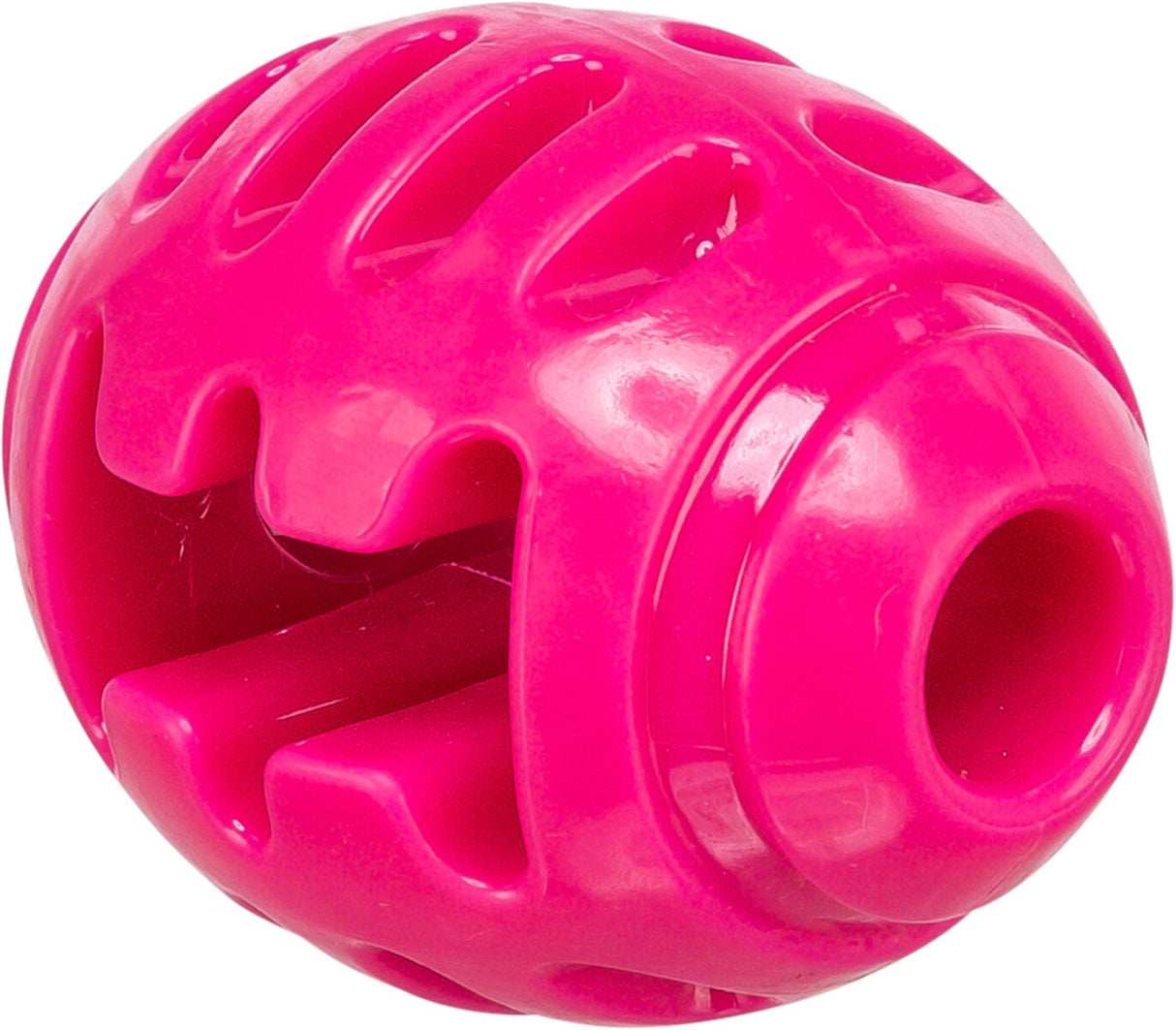 Rosa Spielzeugball mit strukturierten Vertiefungen und Öffnungen, glänzende Oberfläche.