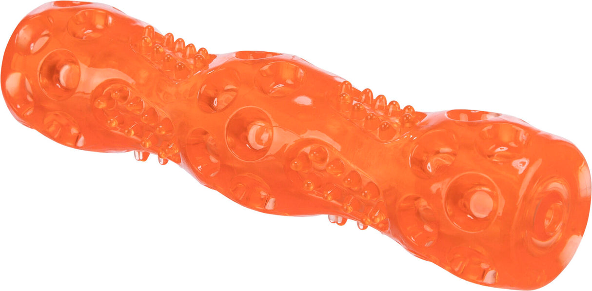 Orange Spielzeug aus Kunststoff mit Noppen und runden Vertiefungen auf der Oberfläche.