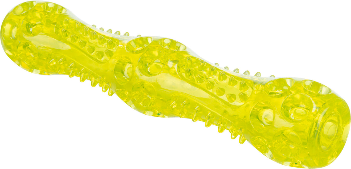 Gelbes, transparents Hundespielzeug in Knochenform mit strukturierten Noppen entlang der Oberfläche.