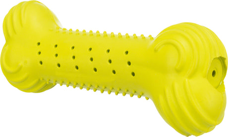Gelbes Spielzeug in Knochenform mit Noppen und Löchern entlang der Oberfläche.