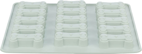 Weiße Silikonform mit zwölf Knochenformen in vier Reihen, verwendet für Backen oder Eiswürfel.