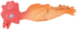 Gummihuhn in orange und rot mit blauen Augen, liegt flach auf der Seite.