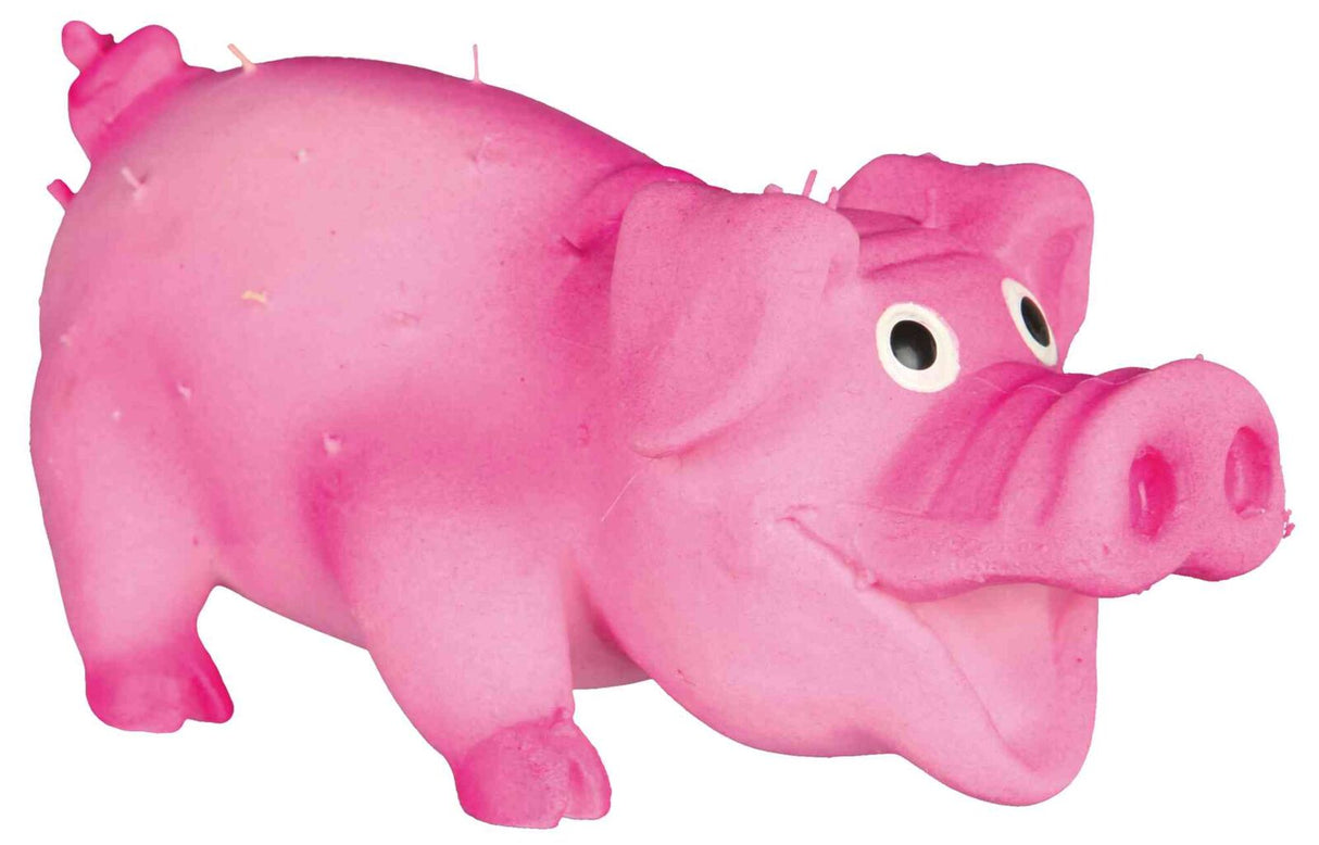 Pinkes Spielzeug in Schweineform mit großen Augen und hervorgehobenen Gesichtszügen.
