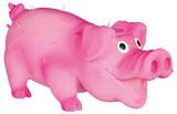 Pinkes Spielzeug in Schweineform mit großen Augen und hervorgehobenen Gesichtszügen.