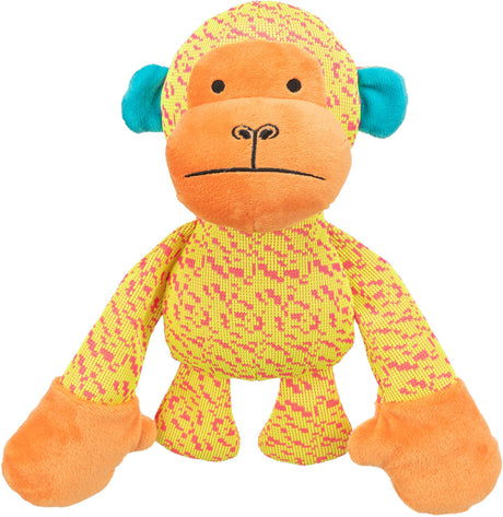 Ein farbenfrohes Stofftier-Affe mit gelbem, gemustertem Körper, orangefarbenem Gesicht und blauen Ohren.