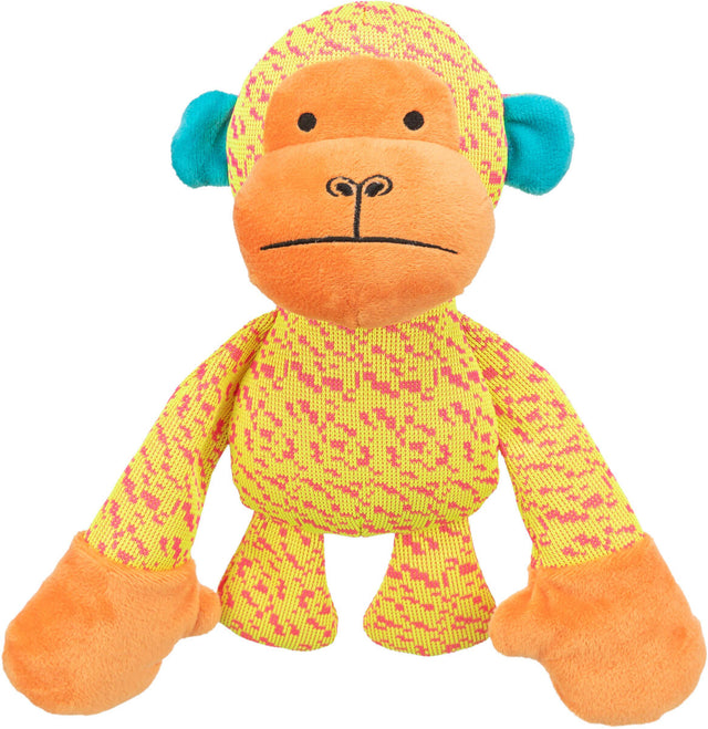 Ein farbenfrohes Stofftier-Affe mit gelbem, gemustertem Körper, orangefarbenem Gesicht und blauen Ohren.