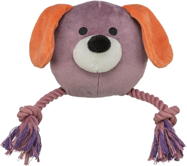 Plüschspielzeug in Form eines lila Hundekopfes mit orangefarbenen Ohren und Seilknoten als Beine.