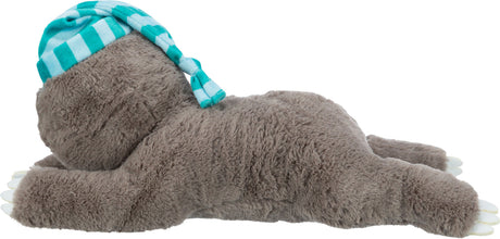 Graues Plüschtier in Tierform mit blau-weiß gestreifter Schlafmütze, liegt bäuchlings auf dem Boden.