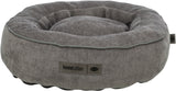 Graues, rundes Hundebett mit erhabenen Rändern, weichem Stoff und einem Etikett mit der Aufschrift "homeEdition Trixie".