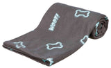 Graue Decke mit hellblauen Knochenmustern und Wort "Woof", aufgerollt dargestellt.