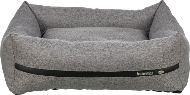 Graues, rechteckiges Hundebett mit erhöhtem Rand, Textur sichtbar, schwarzer Streifen, Aufschrift "homeEdition Trixie".