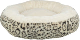 Rundes, cremefarbenes Tierbett mit Leopardenmuster am Rand, plüschig und flauschig gepolstert.