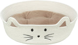Rundes, weißes Katzenbett mit aufgesticktem Katzengesicht und innen liegendem, beigefarbenem Kissen.