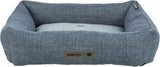 Rechteckiges, blaues Hundebett mit Kissen, gemustertem Stoff und "homeEdition" sowie "TRIXIE"-Logo.