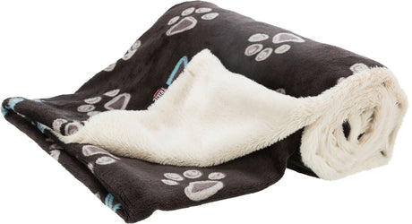 Weiche Hundedecke in Dunkelbraun mit cremefarbener Rückseite und Pfotenmuster in Weiß und Blau.