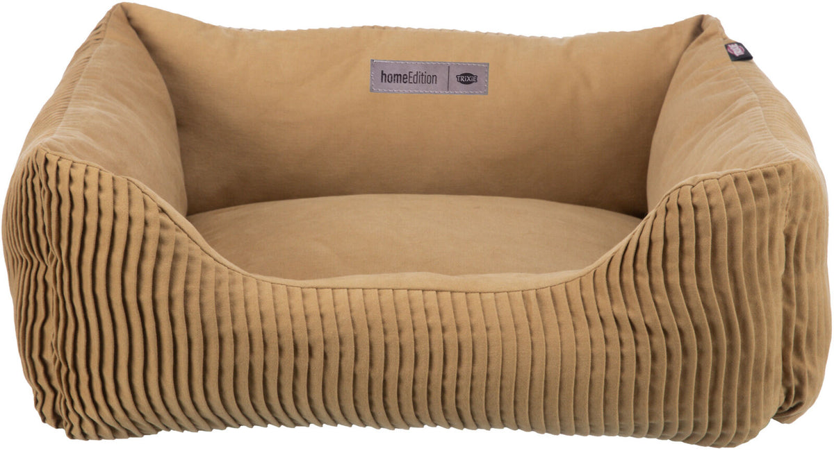 Braunes Tierbett mit gerippten Seiten und einem Label "home Edition Trixie" auf der Innenseite.