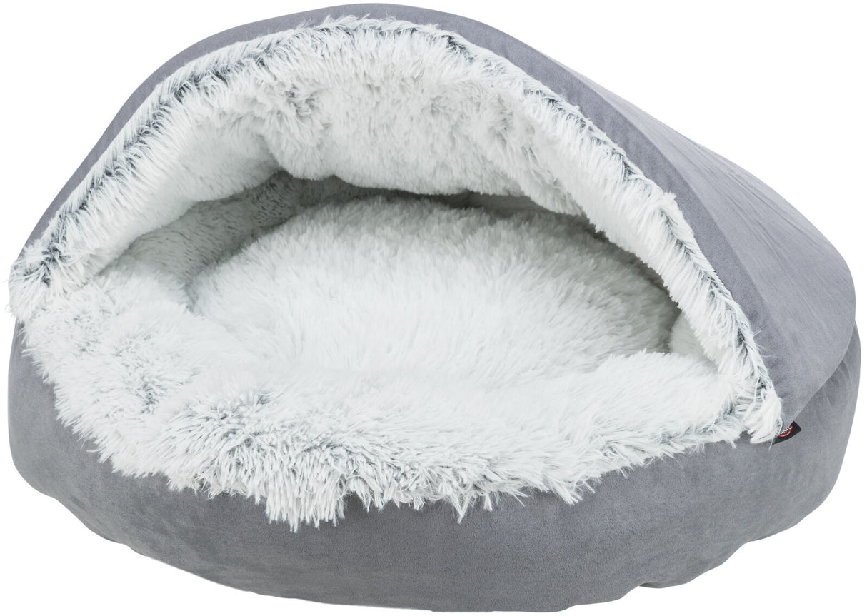 Rundes, graues Bett mit flauschigem weißen Innenfutter, halbrund überdacht, vermutlich für Haustiere.