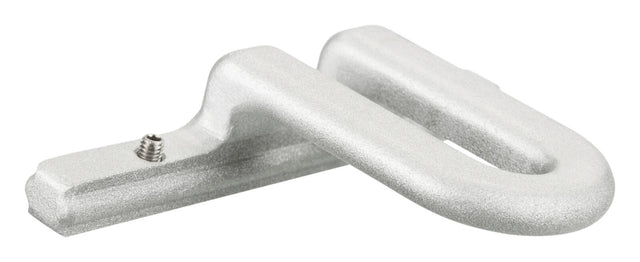 Silbernes, metallisches Bauteil mit gebogener Form und einer Schraube auf flacher Oberfläche.