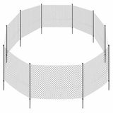 Ein kreisförmiger, schwarzer Metallzaun aus Gittergeflecht mit mehreren vertikalen Pfosten.