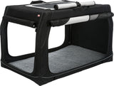 Schwarze, faltbare Transportbox mit grauem Innenpolster und seitlichen Netzeinsätzen für Belüftung.