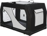 Schwarze und weiße Transportbox mit Netzfenstern und Tragegriffen, eckige Form, Klappe an der Seite.