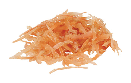 Ein Haufen getrockneter, orangefarbener Streifen auf weißem Hintergrund, mit durchscheinender, unregelmäßiger Form.