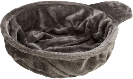Rundes, graues, plüschiges Bett mit hoher Umrandung, flauschige Oberfläche.