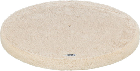 Rundes, beiges, flauschiges Kissen mit eingeprägtem Logo "Trixie" an der Unterseite, Oberfläche samtig.