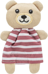 Ein gestrickter Teddybär mit gestreiftem Kleid in Rot und Weiß, hat aufgestickte Augen und ein Lächeln.