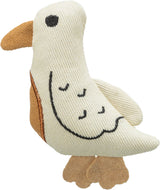 Stofftier in Form eines Vogels mit weißem Körper, braunem Schnabel und beigen Füßen, mit gestickten schwarzen Details.