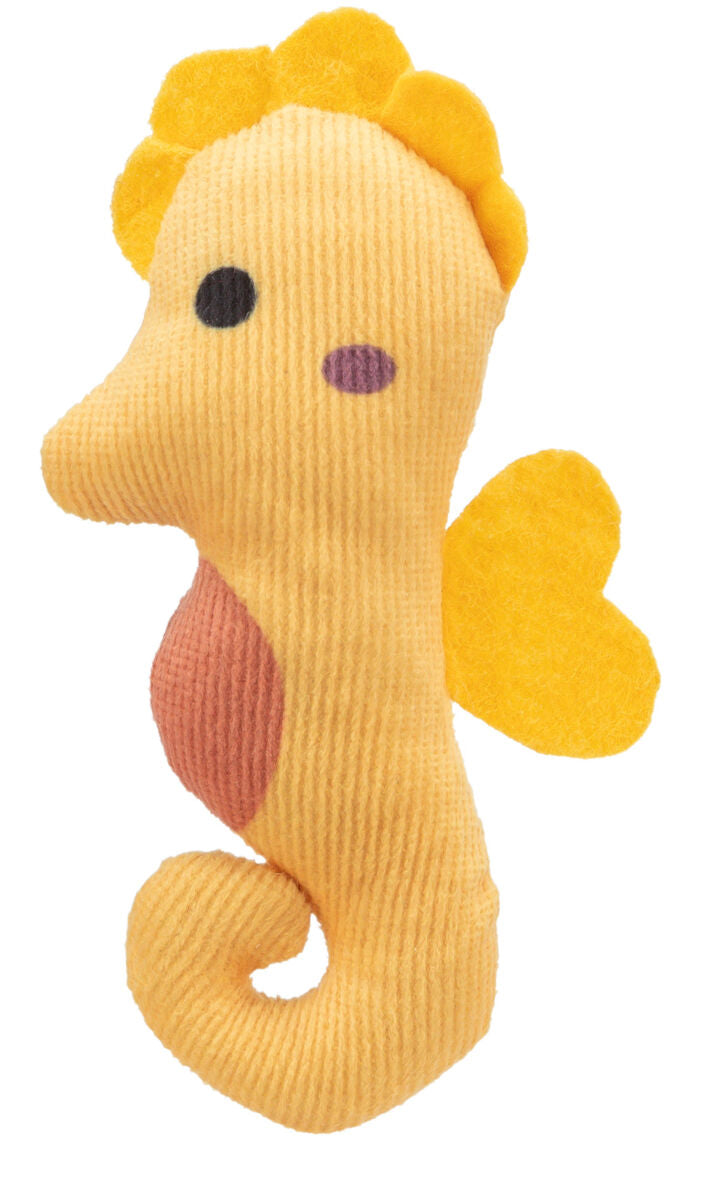 Kuscheltier in Form eines orange-gelben Seepferdchens mit schwarzen Augen und gelber Flosse in Herzform.